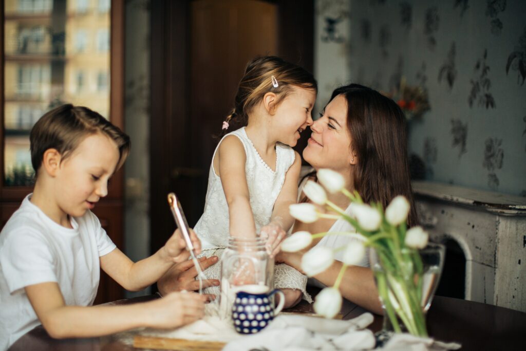 A family spending time together in their home kept warm by an eco-friendly heating solution 