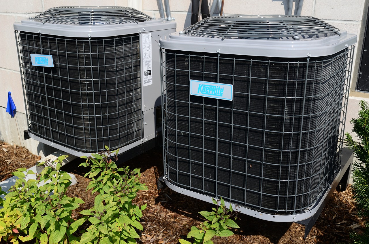 Two air conditioning condensers outside a West Chester, PA home